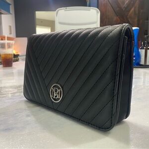 Black leather clutch with shoulder strap